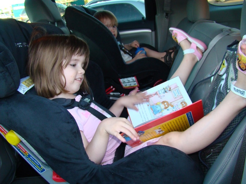 Baby’s Feet Touch the Back of the Vehicle Seat