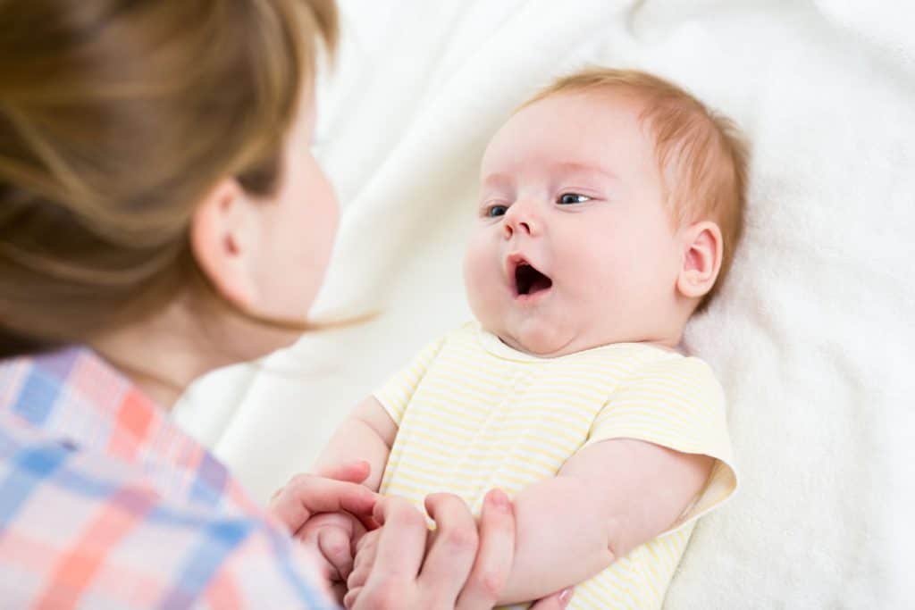 mother sings her baby