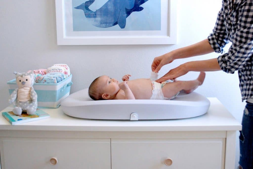 baby on the changing table