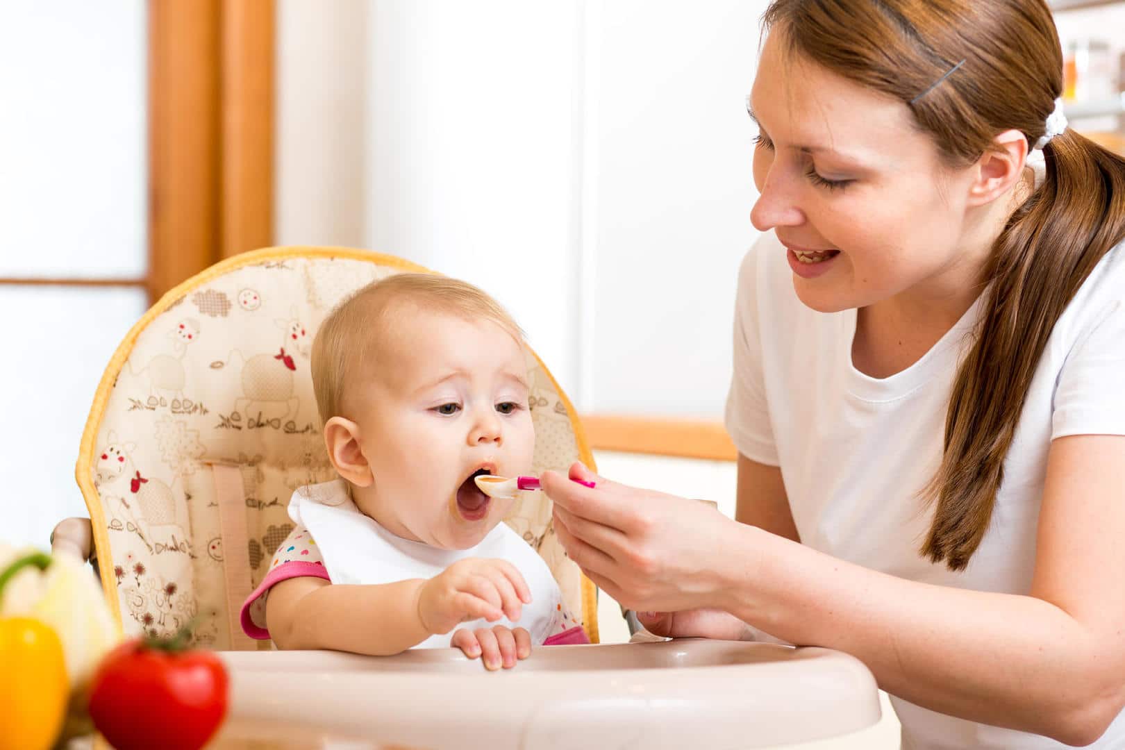 Mom feeds baby