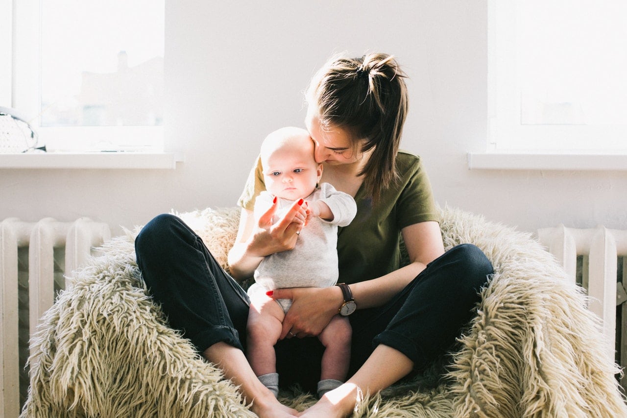 baby with mommy home inside