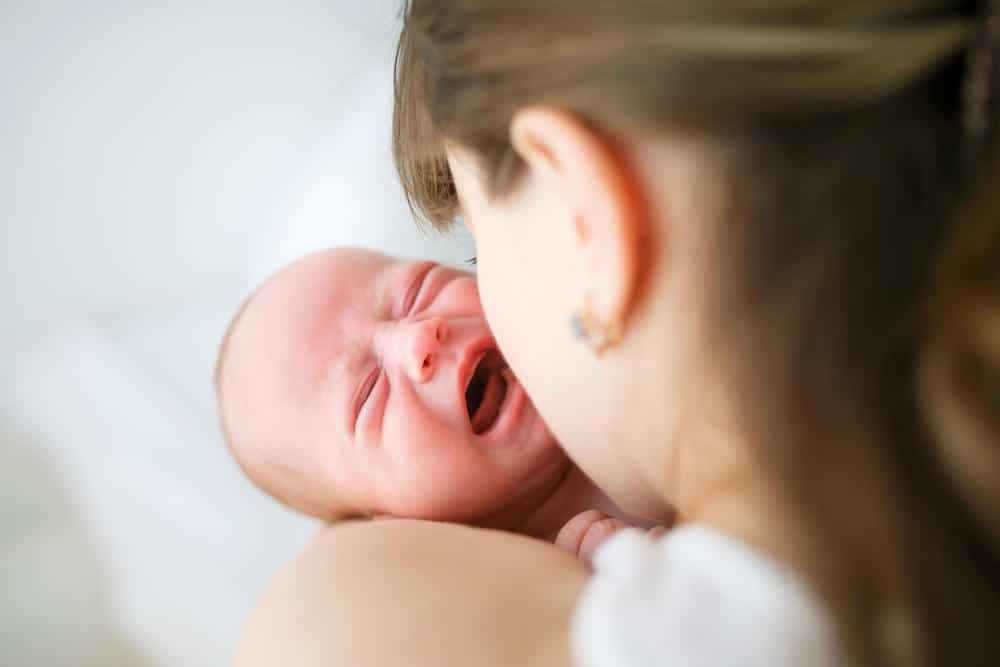 mom holding a colicky baby