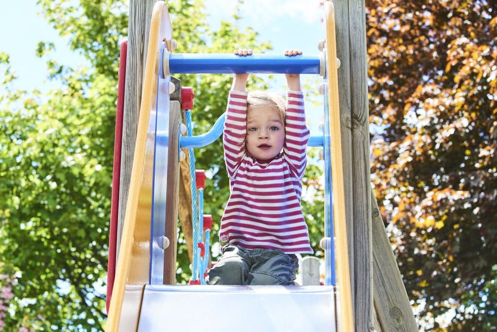 toddler playing sliding